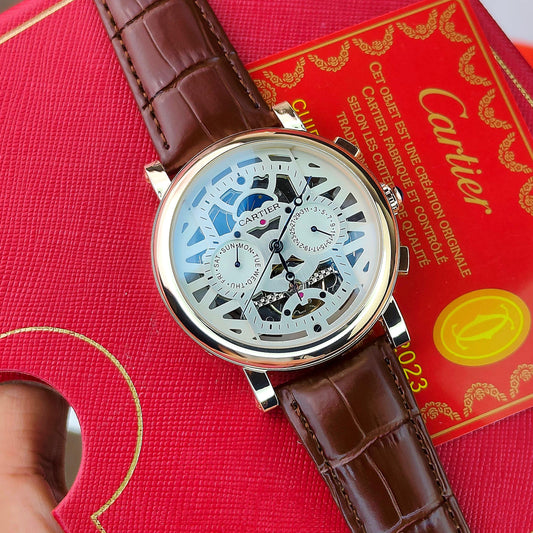 CA_TIER AUTOMATIC WATCH WITH A SKELETONIZED DIAL A BROWN LEATHER STRAP DAY AND DATE INDICATORS