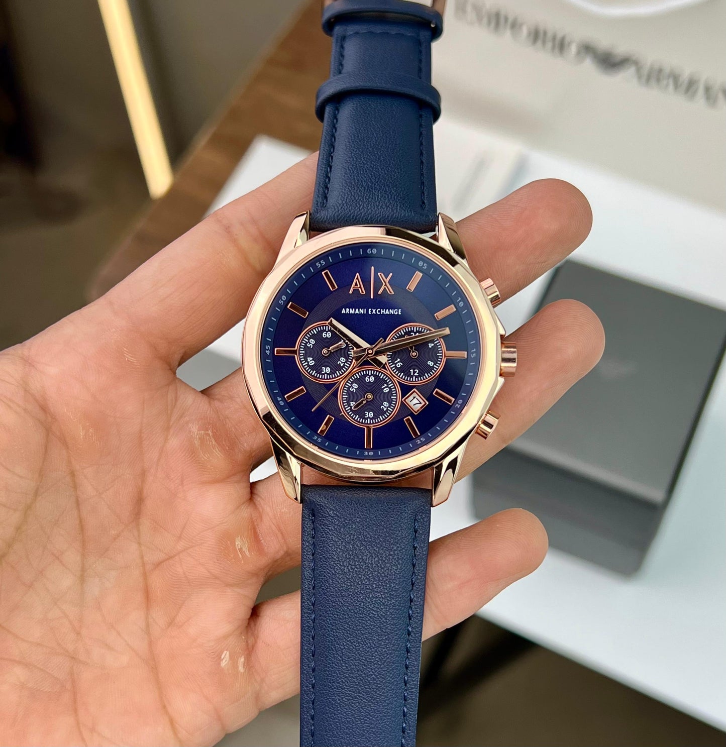 AR_ANI EXCH_NGE MEN’S AX1723 CHRONOGRAPH WATCH A BLUE DIAL ROSE GOLD TONE STICK AND A BLUE LEATHER STRAP