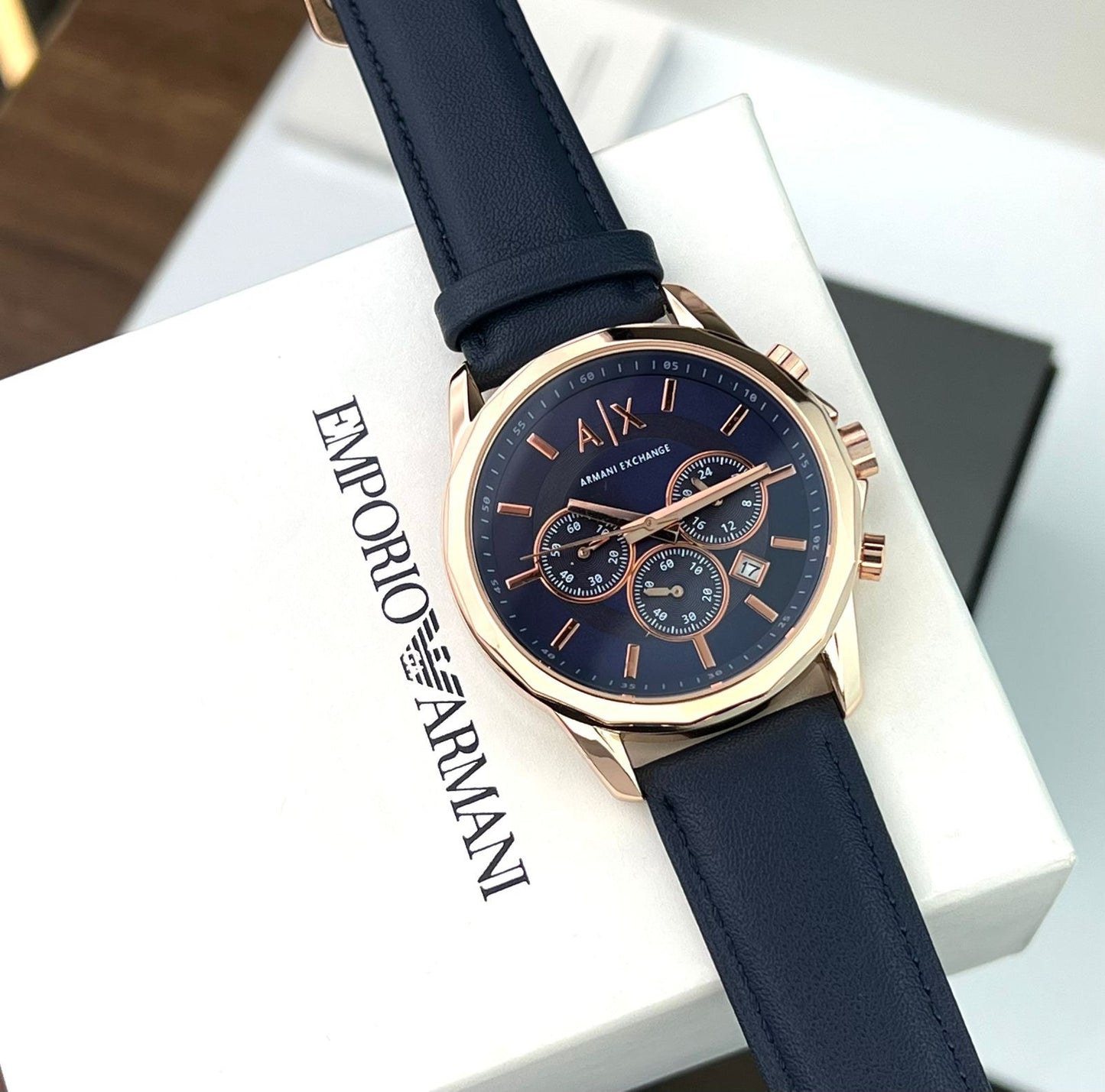 AR_ANI EXCH_NGE MEN’S AX1723 CHRONOGRAPH WATCH A BLUE DIAL ROSE GOLD TONE STICK AND A BLUE LEATHER STRAP