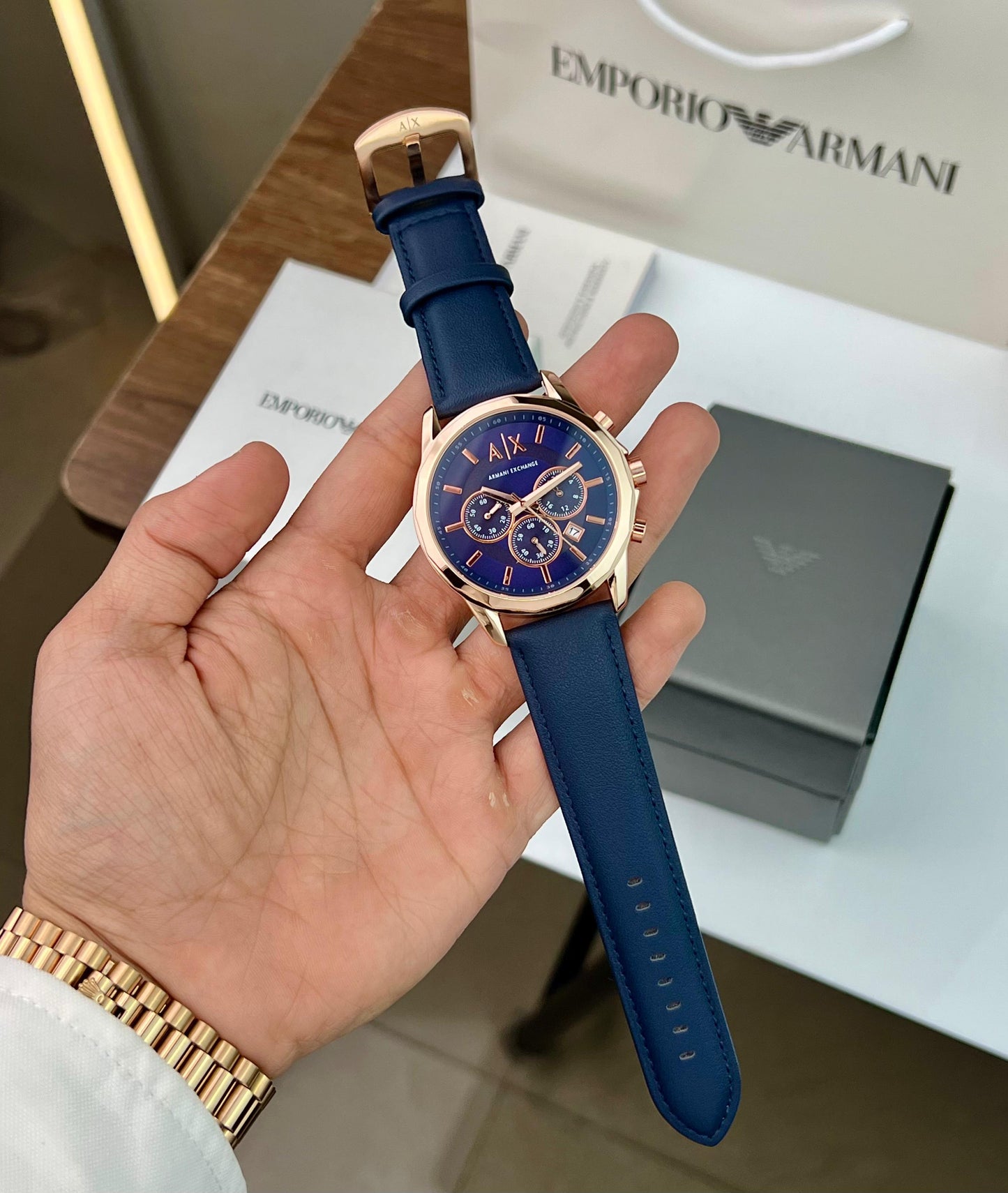 AR_ANI EXCH_NGE MEN’S AX1723 CHRONOGRAPH WATCH A BLUE DIAL ROSE GOLD TONE STICK AND A BLUE LEATHER STRAP