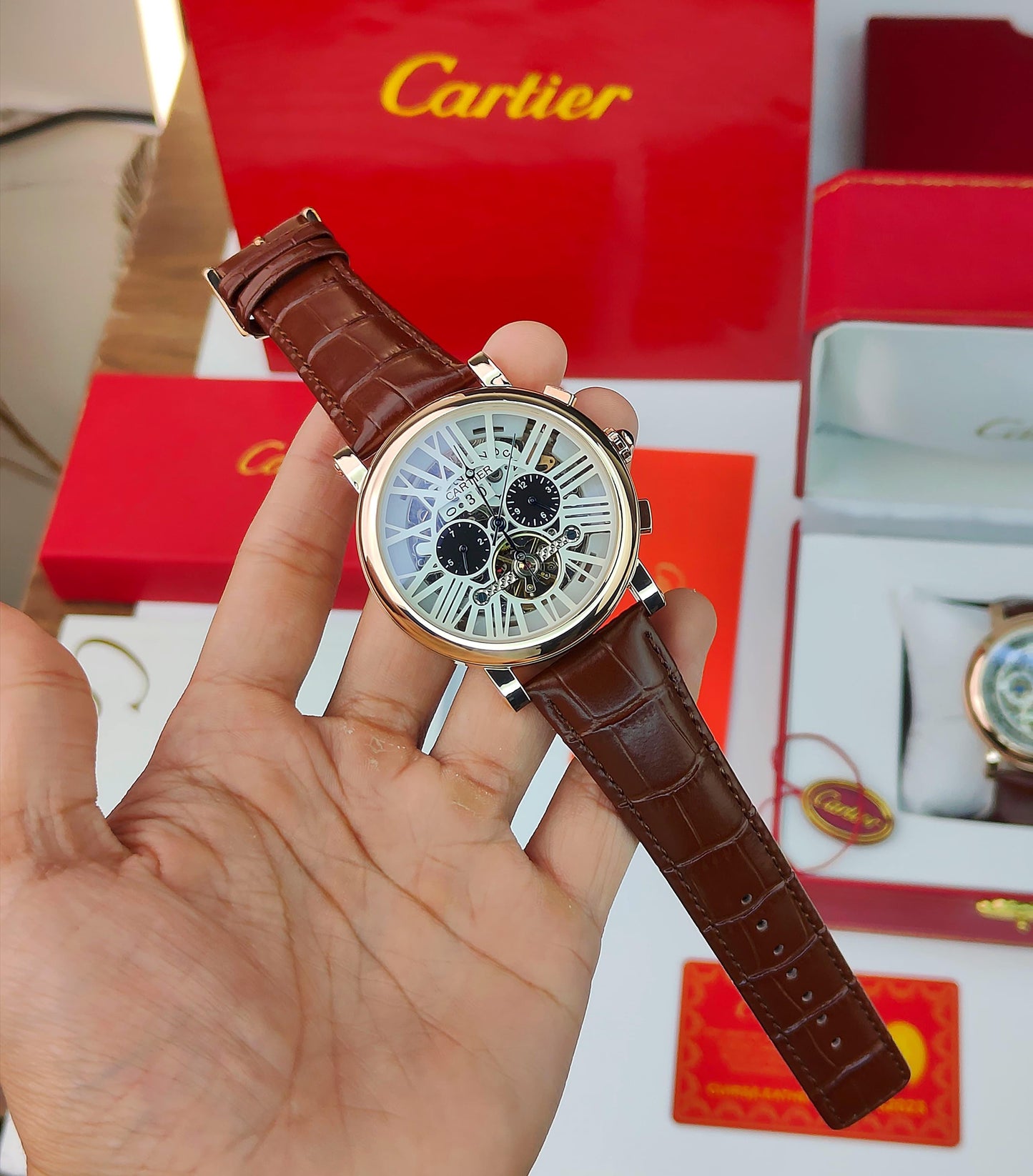 CA_TIER OPEN HEART TOURBILLON WATCH A BROWN LEATHER STRAP AN AUTOMATIC MOMENT AND ROSE GOLD CASE